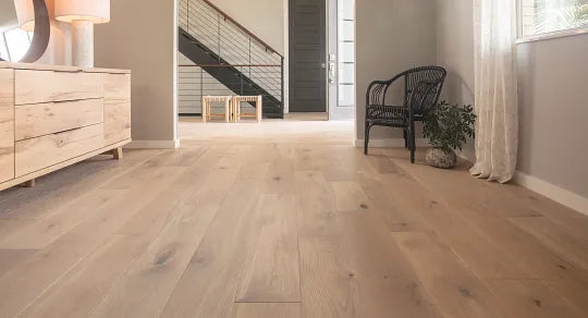 Choosing the right hard surface flooring for your home — wood, laminate,  or vinyl.