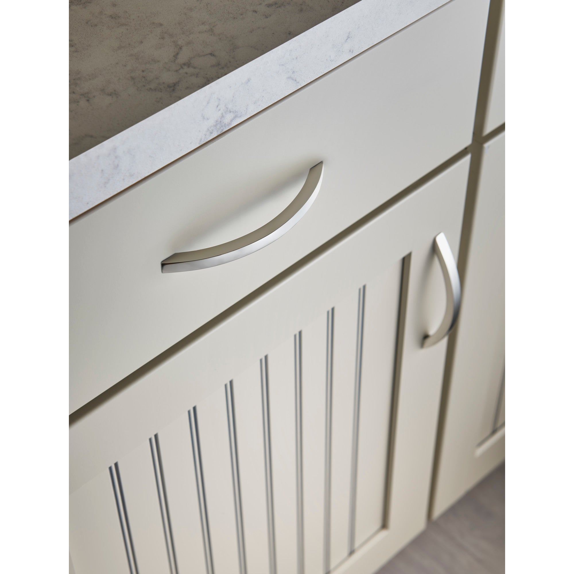 Worldwide Flooring Design Center Iola Pull 5 1/16 Inch (c-c) Polished Stainless Steel Iola Pull 5 1/16 Inch (c-c) Polished Stainless Steel Top Knobs Decorative Hardware