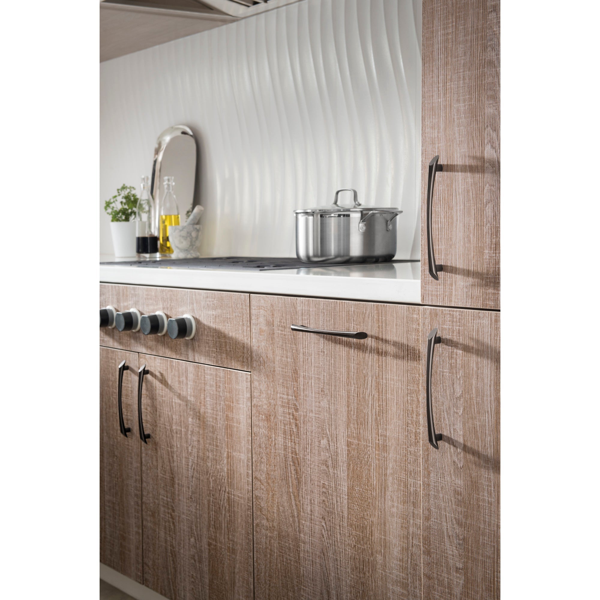 Worldwide Flooring Design Center Edgewater Pull 5 1/16 Inch (c-c) Oil Rubbed Bronze Edgewater Pull 5 1/16 Inch (c-c) Oil Rubbed Bronze Top Knobs Decorative Hardware